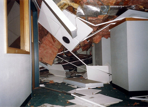 An ice storm causes the Lottery Headquarters roof to collapse, with everyone getting out safely